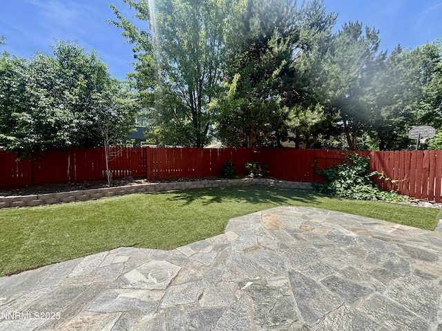 3882 Streamside Ct, Reno, NV 89519 - fenced backyard featuring a patio