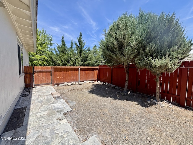 3882 Streamside Ct, Reno, NV 89519 - fenced backyard with a gate
