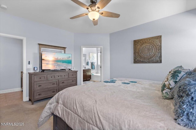 7324 Continuum Dr, Reno, NV 89506 - bedroom featuring light carpet, ensuite bath, and a ceiling fan