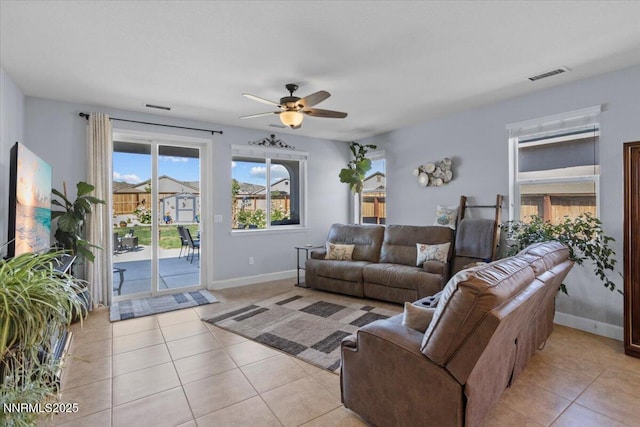 7324 Continuum Dr, Reno, NV 89506 - living area with light tile patterned floors and ceiling fan