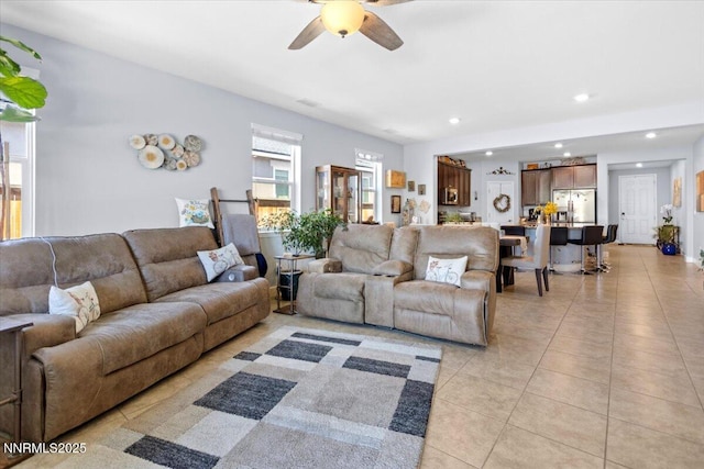 7324 Continuum Dr, Reno, NV 89506 - living room with light tile patterned floors, ceiling fan, and recessed lighting
