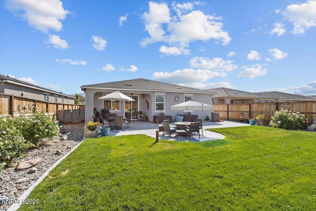 7324 Continuum Dr, Reno, NV 89506 - back of house with stucco siding, a patio, and a fenced backyard