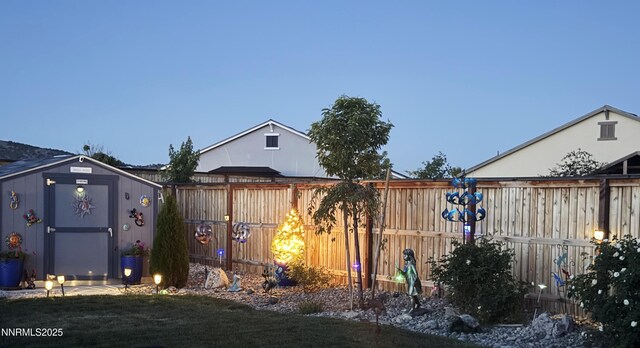 7324 Continuum Dr, Reno, NV 89506 - fenced backyard featuring a storage unit