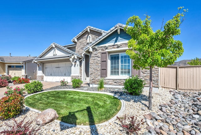 2222 Nasrullah Ln, Reno, NV 89521 - view of front facade with stone siding, an attached garage, concrete driveway, and a tile roof