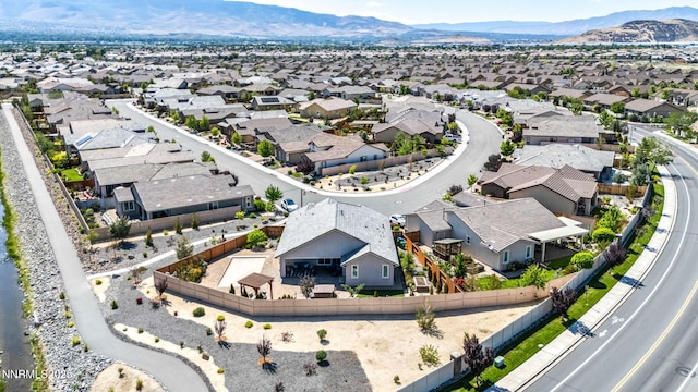 2222 Nasrullah Ln, Reno, NV 89521 - aerial perspective of suburban area with a mountain backdrop