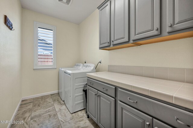 2222 Nasrullah Ln, Reno, NV 89521 - laundry room featuring cabinet space and separate washer and dryer