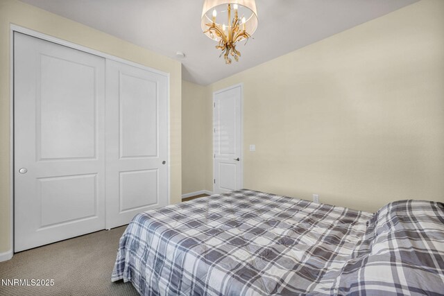 2222 Nasrullah Ln, Reno, NV 89521 - carpeted bedroom featuring a chandelier and a closet