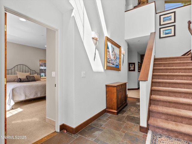 275 Deer Ct, Incline Village, NV 89451 - stairway with baseboards and stone tile flooring