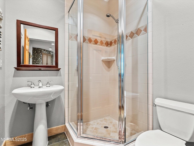 275 Deer Ct, Incline Village, NV 89451 - bathroom featuring a stall shower and a textured wall