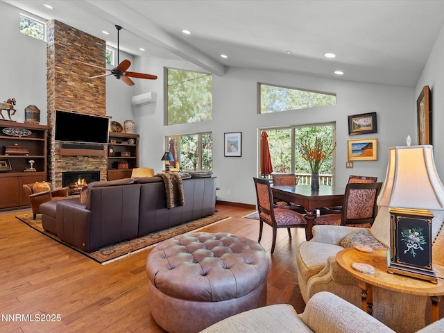 275 Deer Ct, Incline Village, NV 89451 - living room with high vaulted ceiling, light wood-style floors, ceiling fan, a stone fireplace, and recessed lighting