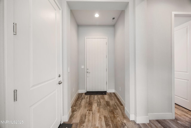 698 Raptor Way, Fernley, NV 89408 - hallway with wood finished floors and recessed lighting