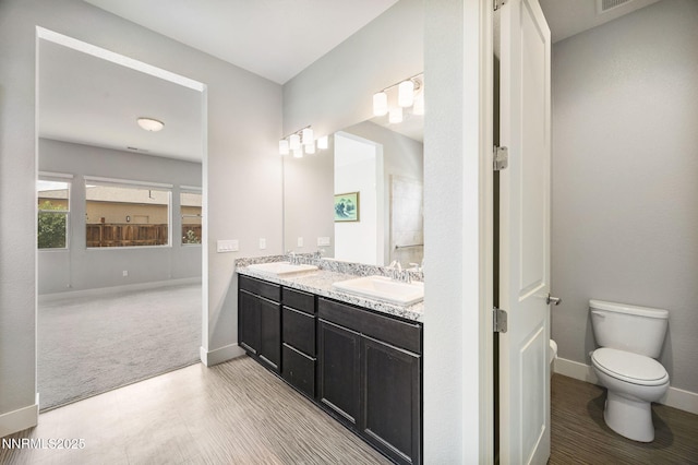 698 Raptor Way, Fernley, NV 89408 - full bathroom with double vanity and tile patterned floors