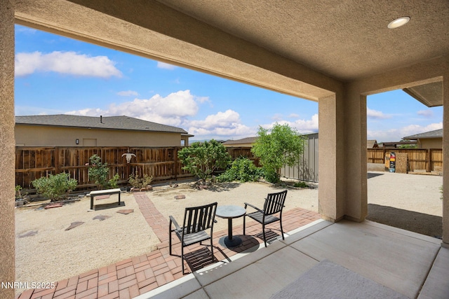 698 Raptor Way, Fernley, NV 89408 - fenced backyard with a patio area