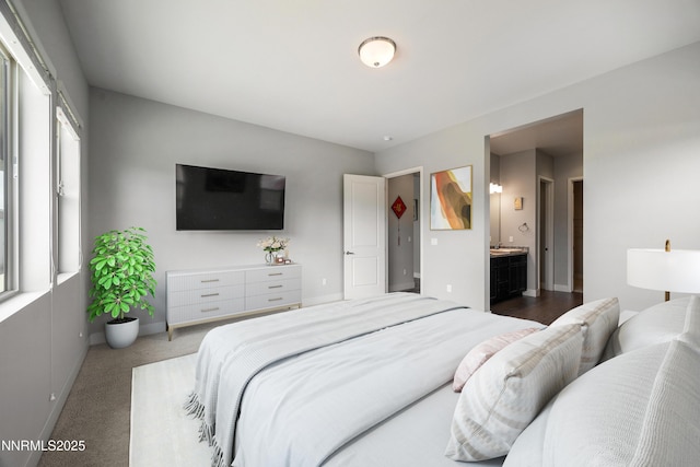 698 Raptor Way, Fernley, NV 89408 - bedroom with baseboards and connected bathroom