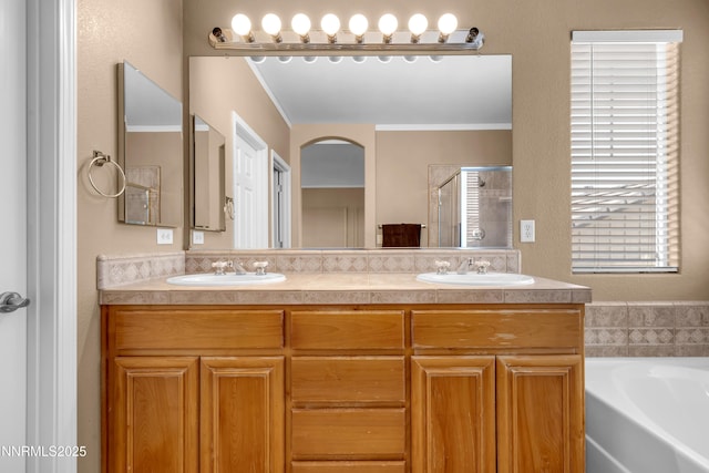 10509 Yuba Ct, Reno, NV 89521 - full bath with a shower stall, double vanity, a bath, and ornamental molding