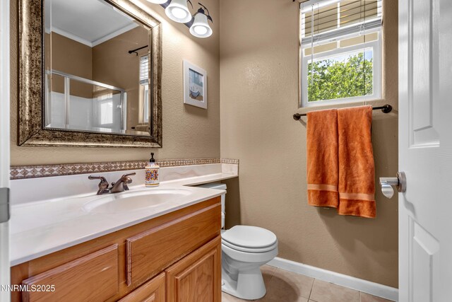 10509 Yuba Ct, Reno, NV 89521 - full bathroom featuring vanity, an enclosed shower, and tile patterned flooring
