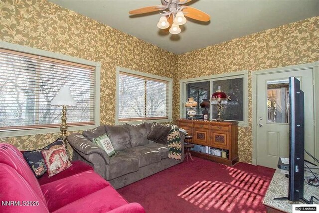 1016 S C St, Virginia City, NV 89440 - carpeted living room with wallpapered walls and a ceiling fan