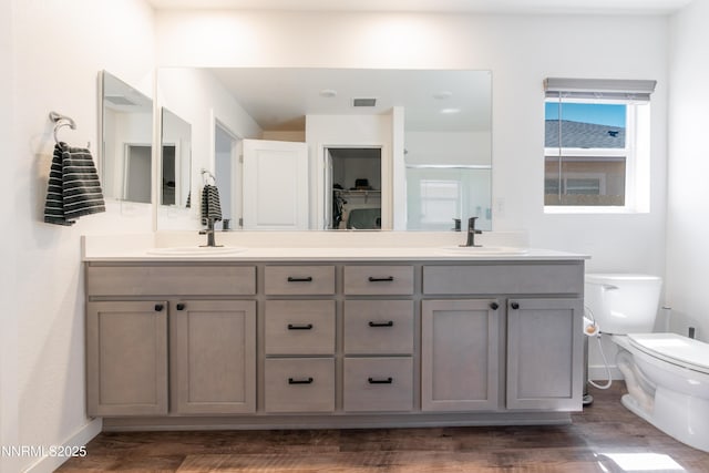 102 Halite Dr, Dayton, NV 89403 - bathroom featuring double vanity, wood finished floors, and a shower