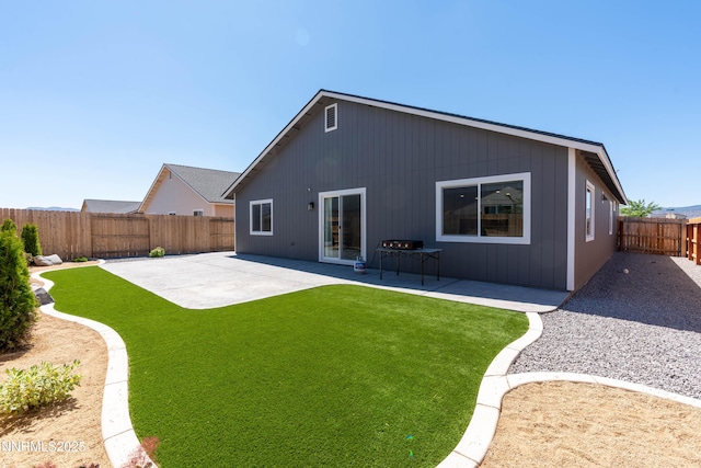 102 Halite Dr, Dayton, NV 89403 - rear view of property with a patio and a fenced backyard
