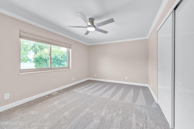 1401 Jefferson Dr, Carson City, NV 89706 - unfurnished bedroom with crown molding, carpet floors, ceiling fan, and a closet