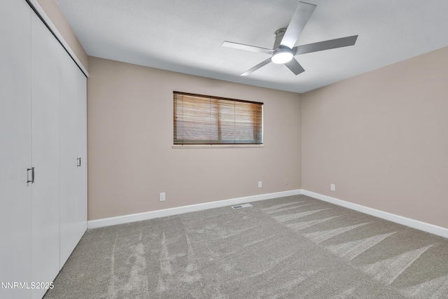1401 Jefferson Dr, Carson City, NV 89706 - unfurnished bedroom with carpet floors, a closet, and ceiling fan