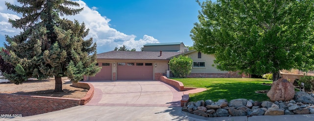 1401 Jefferson Dr, Carson City, NV 89706 - view of front of house featuring stucco siding, an attached garage, concrete driveway, and a front yard