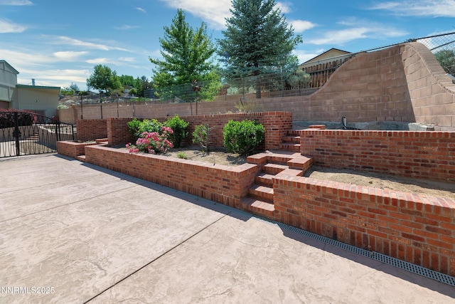 1401 Jefferson Dr, Carson City, NV 89706 - fenced backyard featuring a patio area