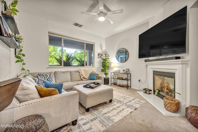 9900 Wilbur May Pkwy Apt 5102, Reno, NV 89521 - living area featuring carpet flooring, a ceiling fan, and a glass covered fireplace