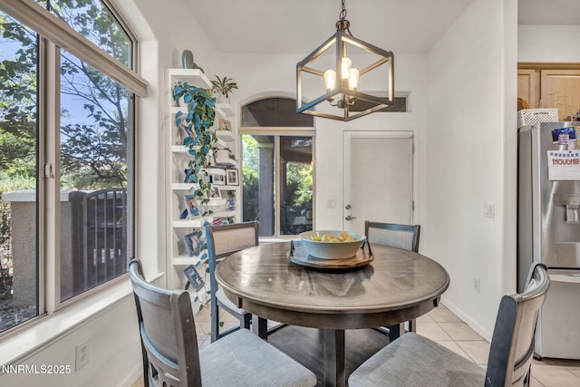 9900 Wilbur May Pkwy Apt 5102, Reno, NV 89521 - dining area featuring a chandelier and light tile patterned floors