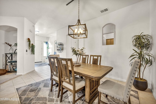 9900 Wilbur May Pkwy Apt 5102, Reno, NV 89521 - dining room featuring light tile patterned floors and a chandelier