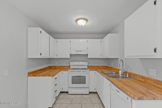 2090 Highview Ct Unit 7, Reno, NV 89512 - kitchen with white appliances, under cabinet range hood, white cabinetry, light tile patterned floors, and light countertops