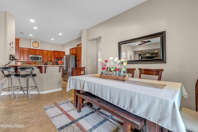 4883 Brunello Dr, Sparks, NV 89436 - dining space featuring recessed lighting, light tile patterned floors, and a ceiling fan