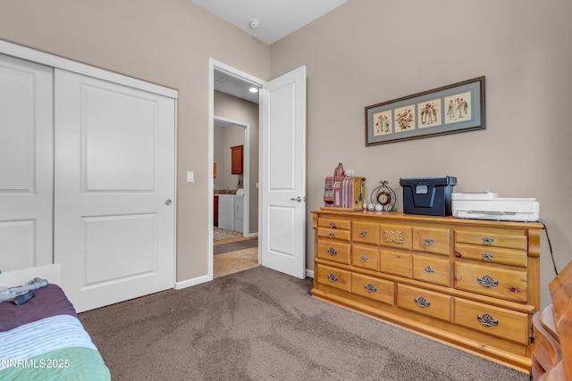 4883 Brunello Dr, Sparks, NV 89436 - bedroom with separate washer and dryer, carpet flooring, and a closet