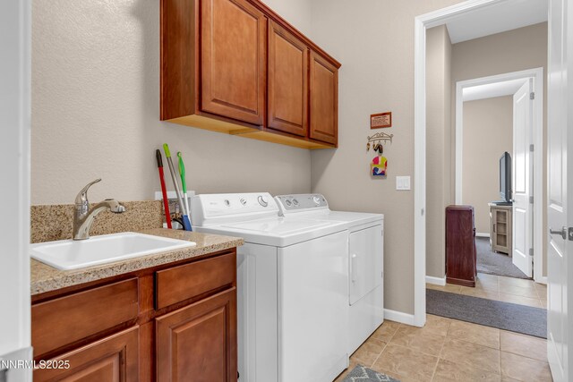 4883 Brunello Dr, Sparks, NV 89436 - washroom featuring cabinet space, washing machine and dryer, and light tile patterned flooring