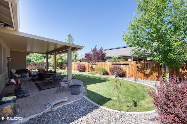 4883 Brunello Dr, Sparks, NV 89436 - fenced backyard with a patio and a putting green