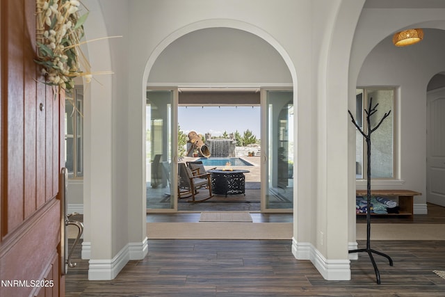 5427 Salmon River Ct, Reno, NV 89511 - entryway featuring arched walkways and wood finished floors