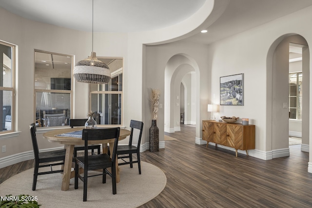 5427 Salmon River Ct, Reno, NV 89511 - dining room featuring arched walkways, wood finished floors, and recessed lighting