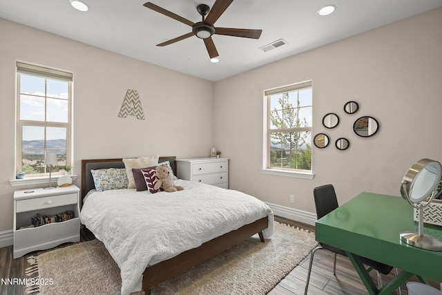 5427 Salmon River Ct, Reno, NV 89511 - bedroom featuring recessed lighting, wood finished floors, and ceiling fan