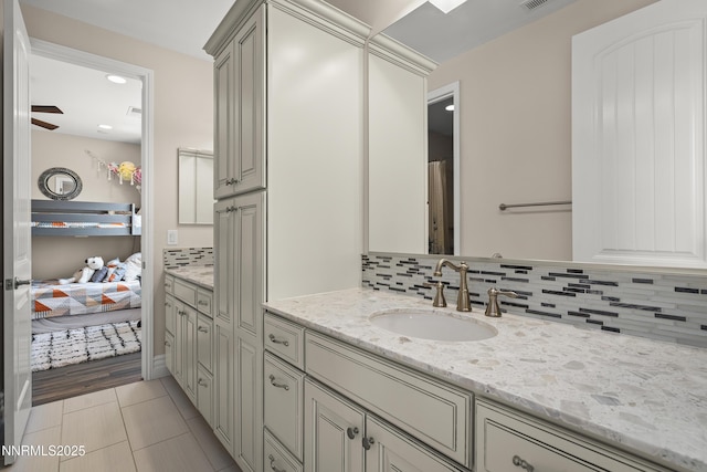 5427 Salmon River Ct, Reno, NV 89511 - full bathroom featuring tasteful backsplash, vanity, ensuite bathroom, tile patterned floors, and recessed lighting