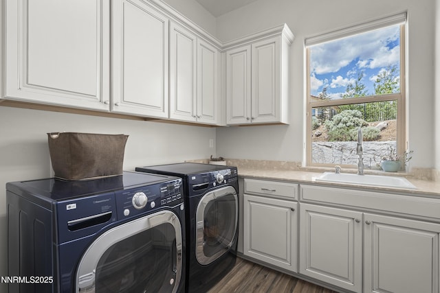 5427 Salmon River Ct, Reno, NV 89511 - laundry area with cabinet space, washer and dryer, and dark wood-type flooring