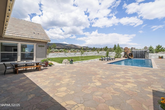 5427 Salmon River Ct, Reno, NV 89511 - swimming pool with a patio area, a mountain view, and a water slide