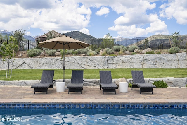 5427 Salmon River Ct, Reno, NV 89511 - view of swimming pool featuring a patio and a mountain view