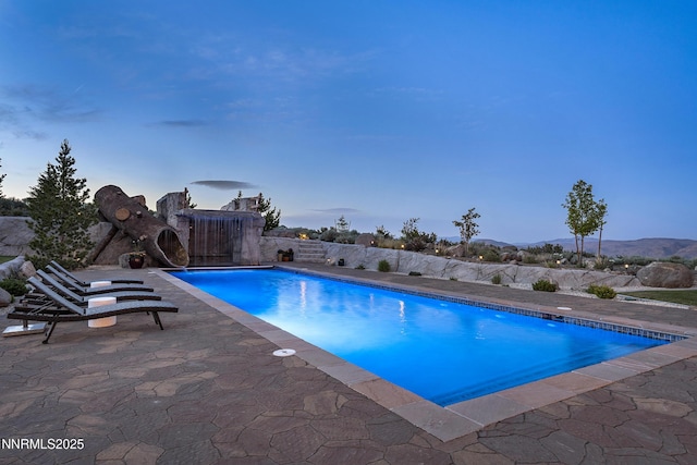 5427 Salmon River Ct, Reno, NV 89511 - view of swimming pool with a patio and a mountain view