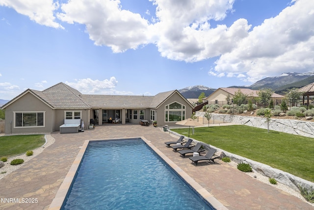 5427 Salmon River Ct, Reno, NV 89511 - view of pool featuring a patio, a jacuzzi, and a mountain view