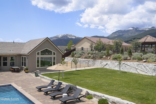 5427 Salmon River Ct, Reno, NV 89511 - view of yard with a mountain view and a patio