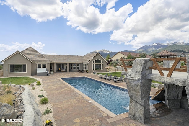 5427 Salmon River Ct, Reno, NV 89511 - outdoor pool with a gazebo, a patio area, and a mountain view