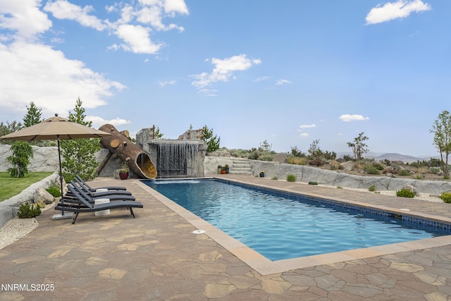 5427 Salmon River Ct, Reno, NV 89511 - view of pool featuring a patio and a mountain view