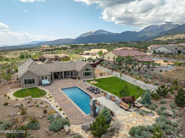 5427 Salmon River Ct, Reno, NV 89511 - view of swimming pool featuring a gazebo, a fenced backyard, a mountain view, and a residential view