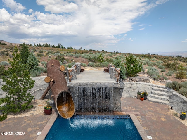 5427 Salmon River Ct, Reno, NV 89511 - outdoor pool with a patio area