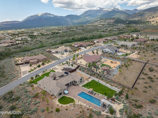 5427 Salmon River Ct, Reno, NV 89511 - aerial perspective of suburban area featuring a mountain backdrop and a pool area
